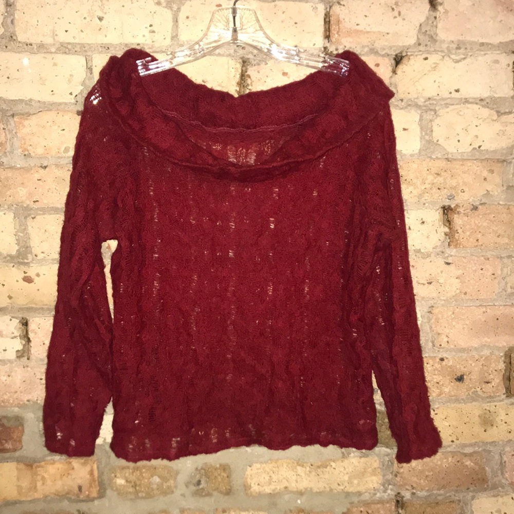 Artisan red knit sweater.